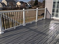 <b>Trex Trancend Island Mist Decking with Tuxedo Mixed Color Utralox Aluminum Railing and Eyeball Lights on Posts</b>